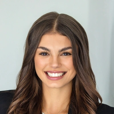 Headshot portrait of a smiling staff member